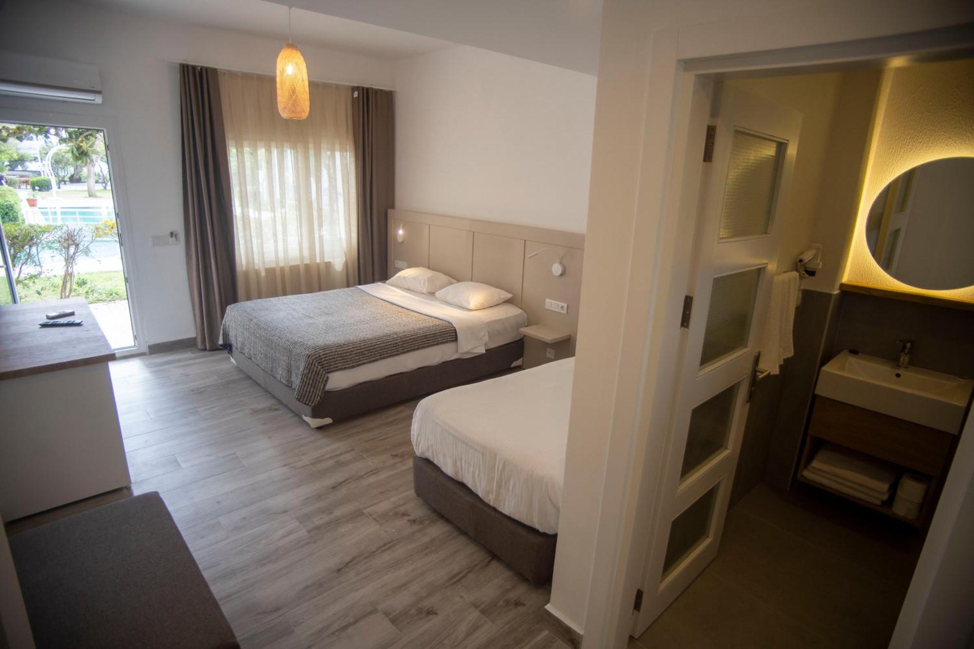 Hotel Gumusluk Pokoj fotografie